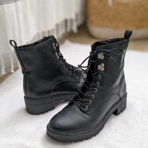Black faux leather combat boots